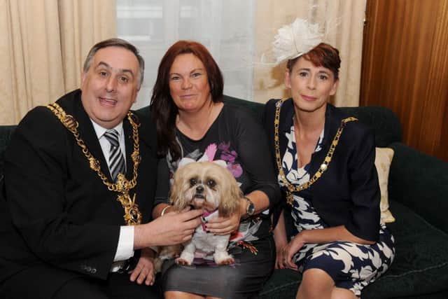 The Lord Mayor of Portsmouth David Fuller, Lady Mayoress of Portsmouth Leza Tremorin and Mary Burgess with her dog Gracie Lou. Picture: Sarah Standing (170463-5493)