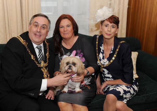 The Lord Mayor of Portsmouth David Fuller, Lady Mayoress of Portsmouth Leza Tremorin and Mary Burgess with her dog Gracie Lou.  Picture: Sarah Standing (170463-5493)