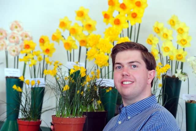 Peter Rogers, who was awarded Best in Show, with his display of daffodils.