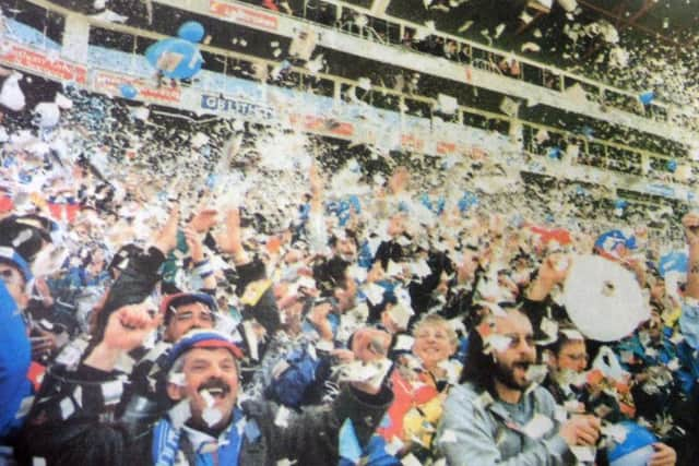 Pompey fans  deliver their tickertape welcome at Highbury