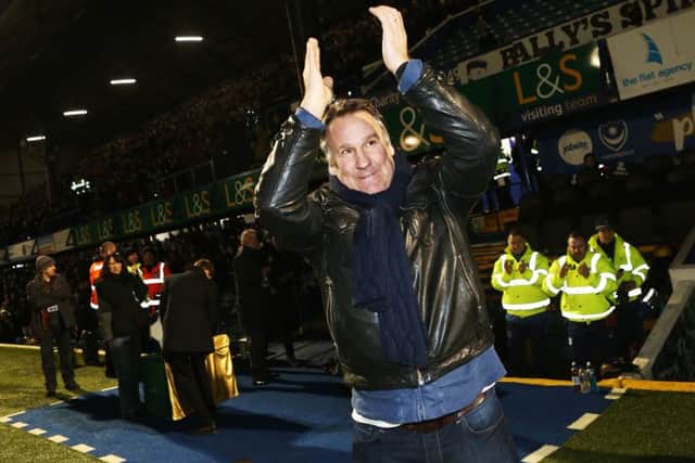 Paul Merson applauds the Fratton faithful during the Morecambe game. Picture: Joe Pepler