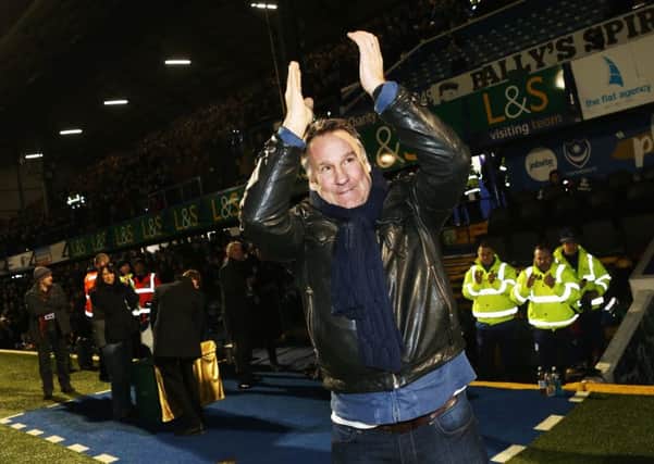 Paul Merson applauds the Fratton faithful during the Morecambe game. Picture: Joe Pepler