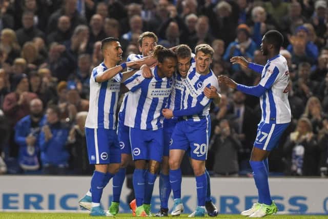 Brighton players celebrate during their 3-1 victory over Birmingham City on Tuesday night. Picture by Phil Westlake