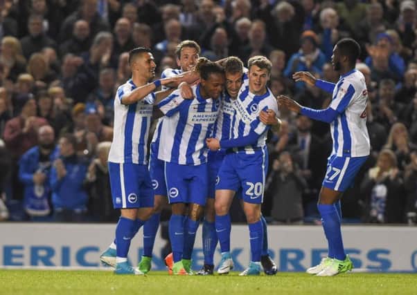 Brighton players celebrate during their 3-1 victory over Birmingham City on Tuesday night. Picture by Phil Westlake