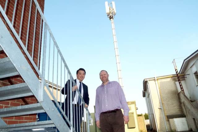 Alan Mak MP with Vodaphones Rob Matthews at the upgraded Hayling mobile phone mast