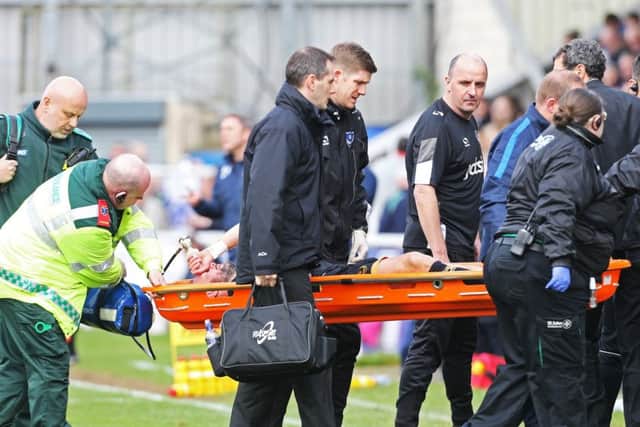 League two -  Hartlepool United vs Portsmouth - 01/04/17PortsmouthÃ¢Â¬"s Noel Hunt dislocated shoulder and has to be stretchered off watched by PortsmouthÃ¢Â¬"s Manager Paul Cook PPP-170304-122209001