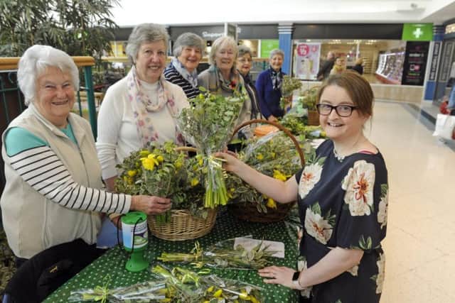 From left, Christine Hillam, Alex Harding, Celia Pullen, Yvonne Barnes, Jennnifer Ibbetson, Olive Anderson and customer Rebecca Smith Picture: Ian Hargreaves (170332-1)