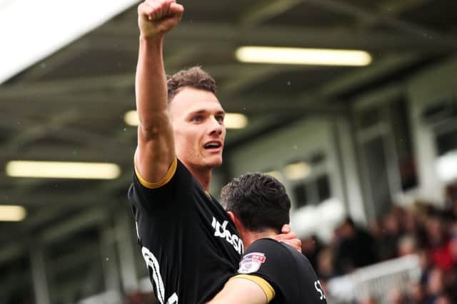 Kal Naismith his goal in Pompey's 2-0 win at Hartlepool with provider Enda Stevens. Picture: Joe Pepler