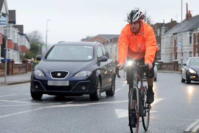 PC Phil Robertson on a 'close pass' operation in Portsmouth.