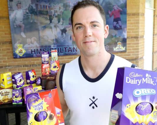 Leading Physical Trainer James Jonno Johnson took Easter eggs from the Eggstravaganza at HMS Sultan to children at St Richards Hospital in Chichester. Photo: PO (Phot) Nicola Harper
