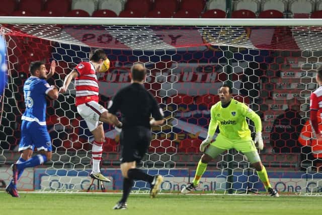 DONCASTER, UK, 5TH JANUARY, 2017.Doncaster's John Marquis scores his first goal of the match during the Sky Bet League 2 match between Doncaster Rovers and Portsmouth at the Keepmoat Stadium, Doncaster, England on 5 January 2017. Photo by Joe Pepler/Digital South. PPP-170501-200138006