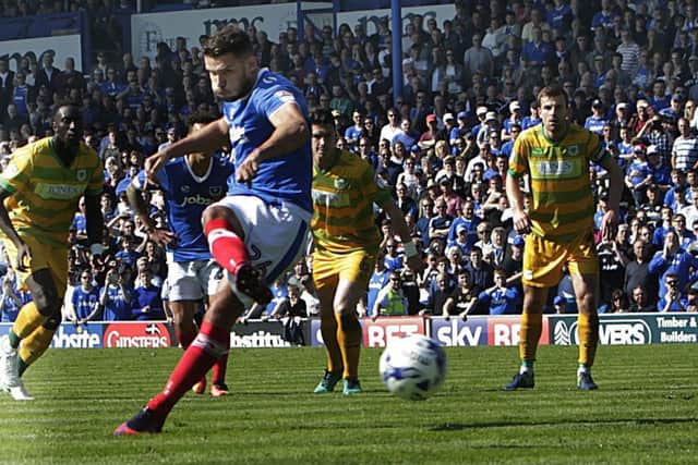 Gareth Evans scores from the penalty spot for Pompey. Picture: Joe Pepler