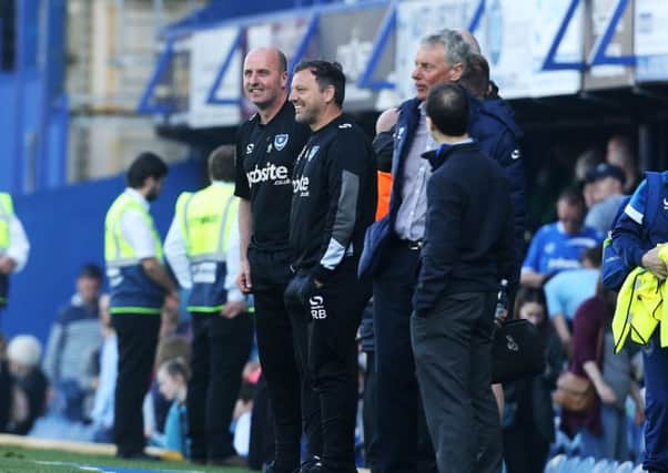 Pompey boss Paul Cook with Leam Richardson. Picture: Joe Pepler