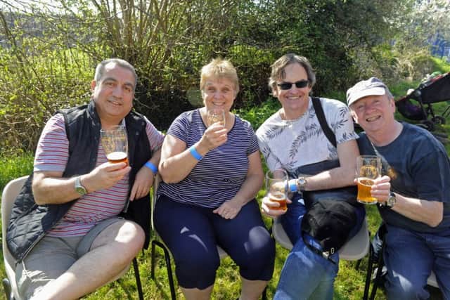 Abe Mazhar, left, with Sally Jouhning, Simon Smith, and Dave Robinson, right. Photo: Ian Hargreaves (170483-1)