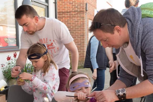 Left to right:  Steven Evans and Ruby, seven.  Evie Burden, five, with dad Matt. Photo: Keith Woodland. 170431
