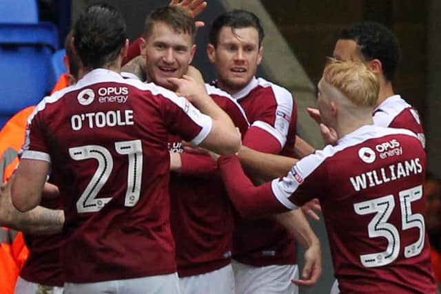Michael Smith celebrates scoring for Northampton against Bolton. Picture: Sharon Lucey