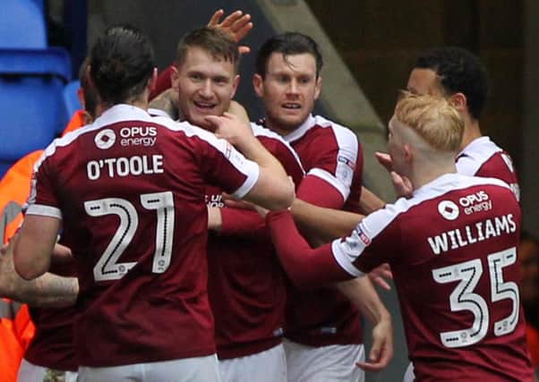 Michael Smith celebrates scoring for Northampton against Bolton. Picture: Sharon Lucey