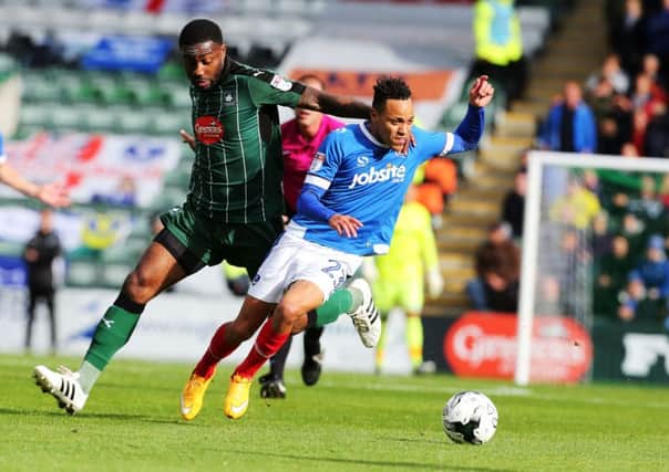 Carl Baker in action for Pompey against Plymouth. Picutre: Joe Pepler
