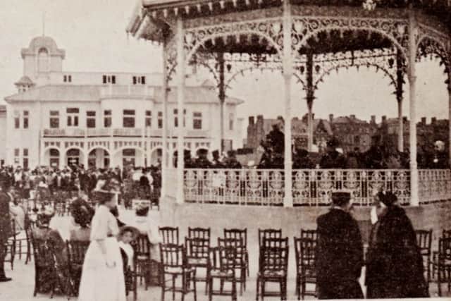 Looking towards South Parade from the end of South Parade Pier with a band in full flow on the bandstand.
