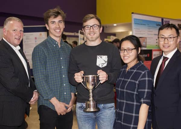 From left, Mark Smith from the Car Finance Company, Edward Adams, Max Graham and Abigail Quek from Polar Enterprises and Dr Xiaoti Hu, a senior lecturer at the University of Portsmouth Business School Picture: Helen Yates