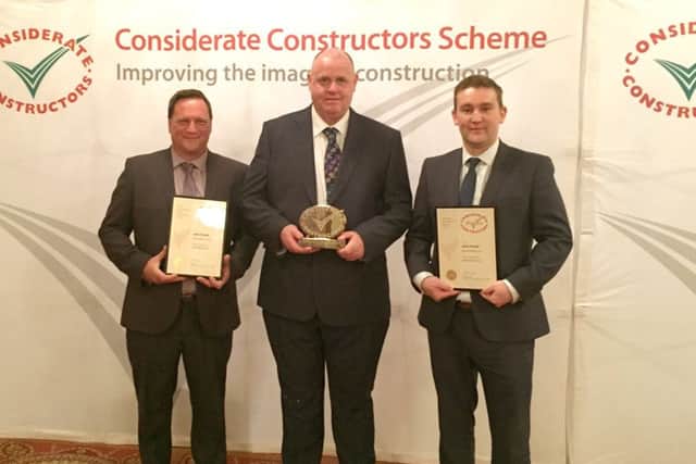 From left, director Jason Bond, project manager John Knott, and director Paul Heather from Ace Southern, which received two outstanding awards at the Considerate Constructors Awards in London
