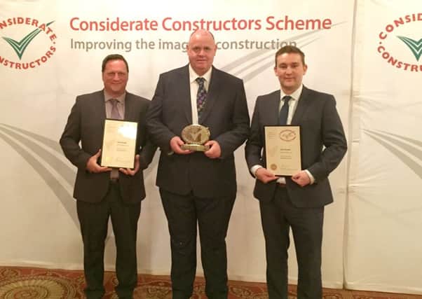 From left, director Jason Bond, project manager John Knott, and director Paul Heather from Ace Southern, which  received two outstanding awards at the Considerate Constructors Awards in London