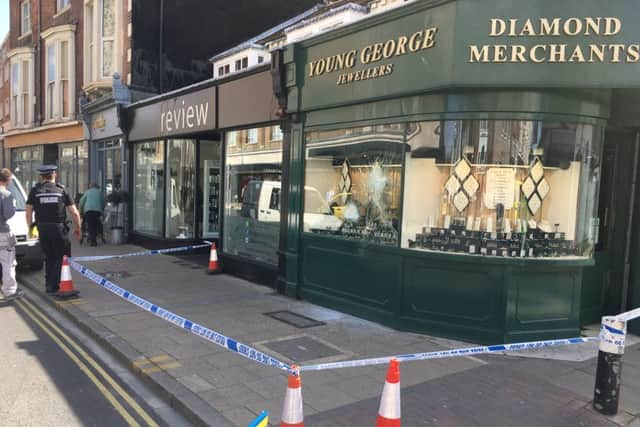 Police cordon off the jewellery store in Osborne Road after the robbery attempt.