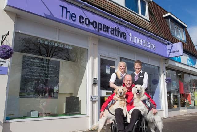 Paula Slape, Endal Junior, Allen Parton from Hounds for Heroes, Rookie and Jackie Dulthie outside The Southern Co-operative Funeral Home in Cowplain