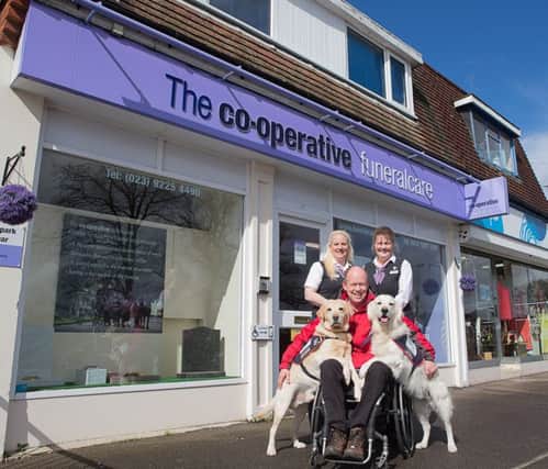 Paula Slape, Endal Junior, Allen Parton from Hounds for Heroes, Rookie and Jackie Dulthie outside The Southern Co-operative Funeral Home in Cowplain