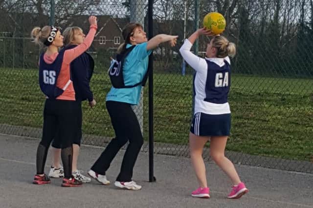Estee Elites shooting for goal against Delme Diamonds