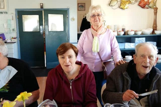 Thelma Turner-Hill, second right, with service users at a lunch for The Fellowship