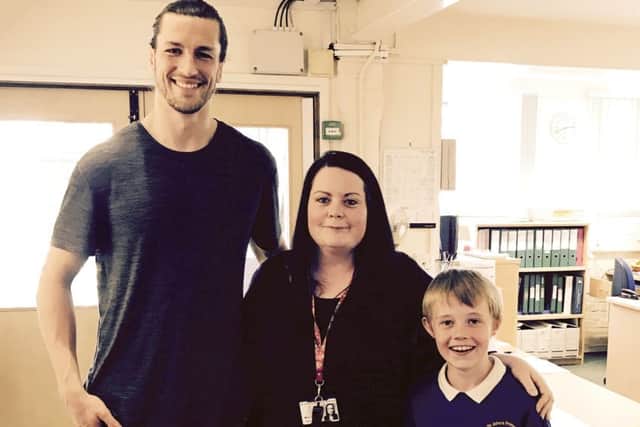 Christian Burgess with teacher Gemma Havey and pupil Kenny Whitear