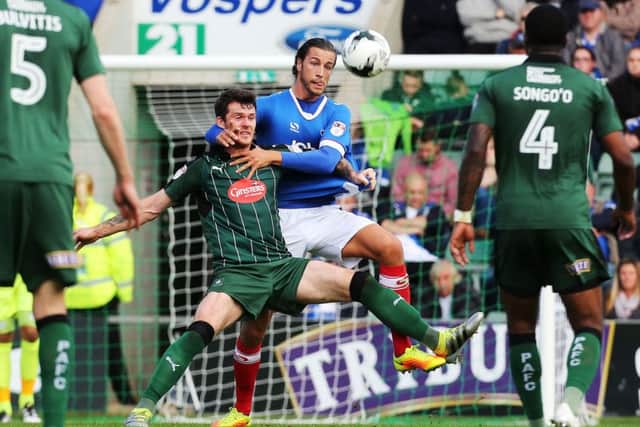 Christian Burgess in action against Plymouth earlier this season. Picture: Joe Pepler