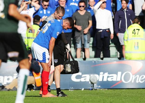 Gareth Evans injured at Plymouth last May. Picture: Joe Pepler
