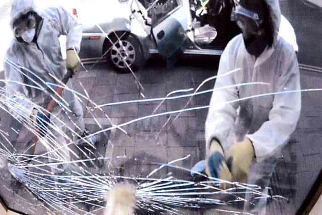 CCTV captures robbers with pickaxes trying to break into Young George Jewellers on Osborne Road, Southsea