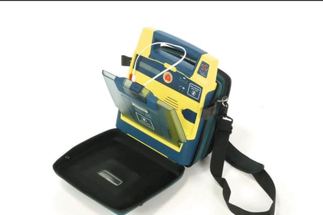 Club members have raised money for a defibrillator to be installed in the minibus
