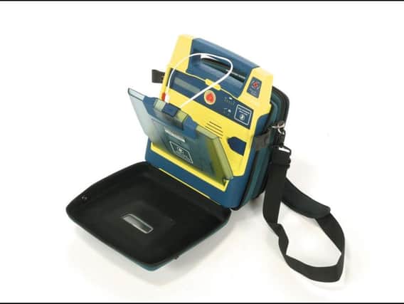 Club members have raised money for a defibrillator to be installed in the minibus