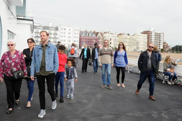 Some of the first visitors to South Parade Pier Picture: Sarah Standing (170498-9735)