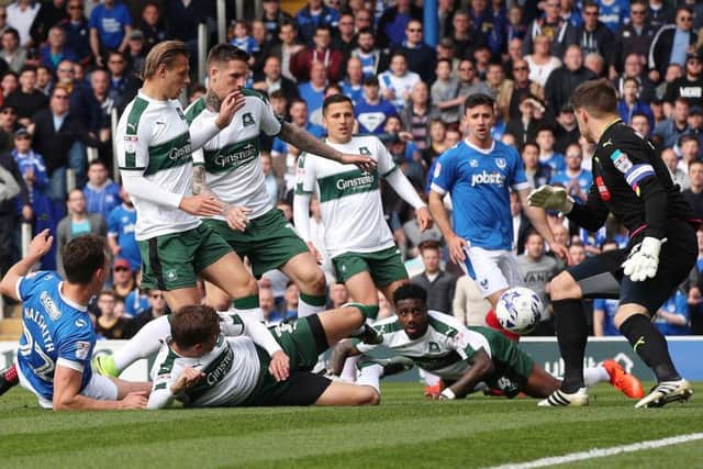 Enda Stevens, right, was named The News' Pompey man of the match Picture: Joe Pepler