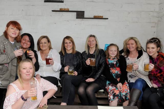 Back from left, Sam Carscadden, 46, Kerry Stirling, 43, Paula Darrington, 49, Lesa Carmichael, 43, Kimberley Howting, 36, Grace Bingham, nine, Karen Bingham, 49, Emily Bingham, 19 and front, Zoe Henderson, 39Picture: Sarah Standing (170500-9868)