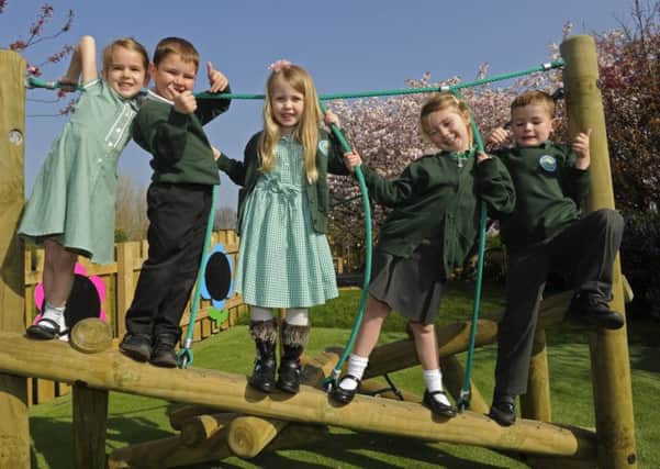 Children at Lee-on-the-Solent Infants School on their new outdoor apparatus Picture: Ian Hargreaves (170345-1)