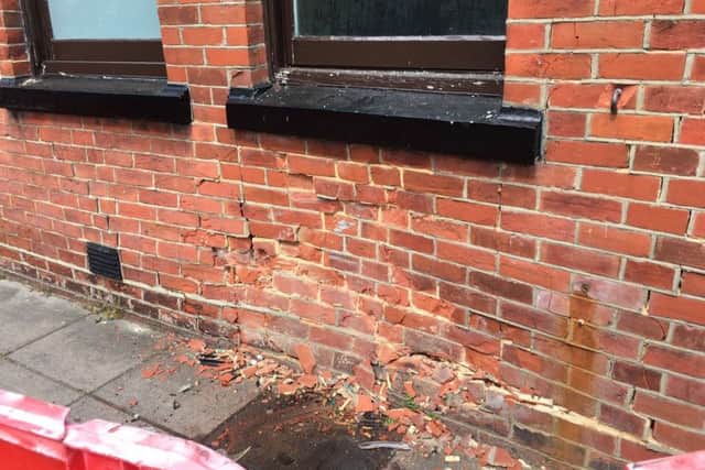 A car crashed into the wall of the George and Dragon pub in Buckland, Portsmouth early this morning Picture: Tom Cotterill