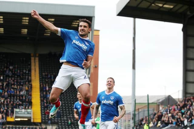 Gareth Evans celebrates after opening the scoring. Picture: Joe Pepler