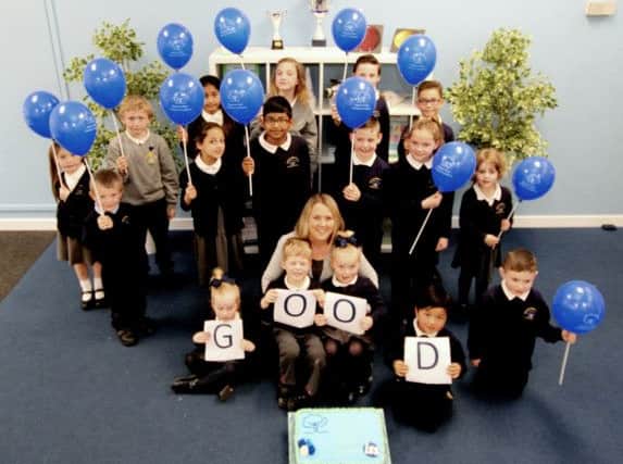 Beacon View Primary School headteacher Emma Sykes with pupils following the great inspection report from Ofsted