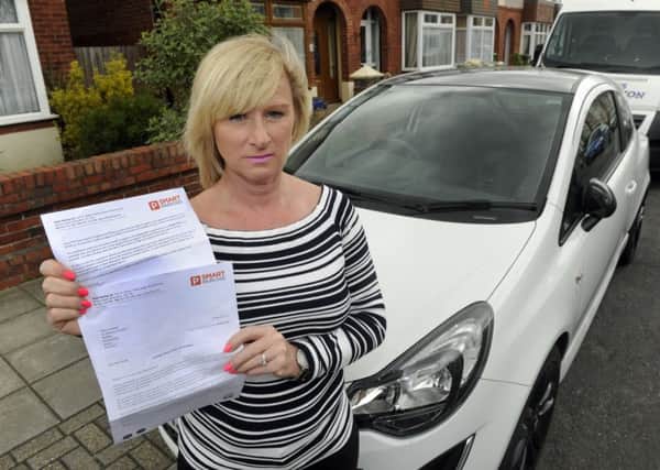 Angela Marks is in a dispute with Smart Parking, which sent her a bill for Â£85 following a problem at Matalan 
Picture Ian Hargreaves (170495-1)