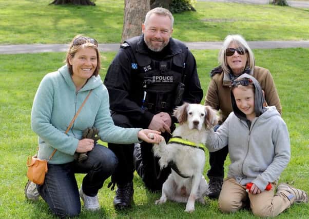 PC Nathan Lucy with drugs dog Finnley a four-year-old springer spaniel and, from left,) Katherine Tate with her mum Ann Olive and son Benjamin 

Picture: Sarah Standing (170503-6075)