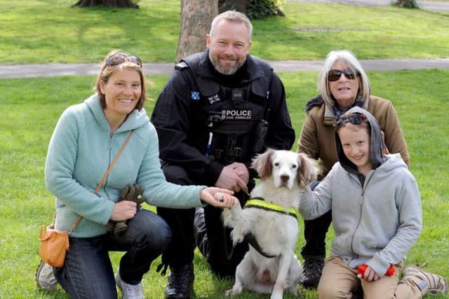 PC Nathan Lucy with drugs dog Finnley a four-year-old springer spaniel and, from left,) Katherine Tate with her mum Ann Olive and son Benjamin Picture: Sarah Standing (170503-6075)