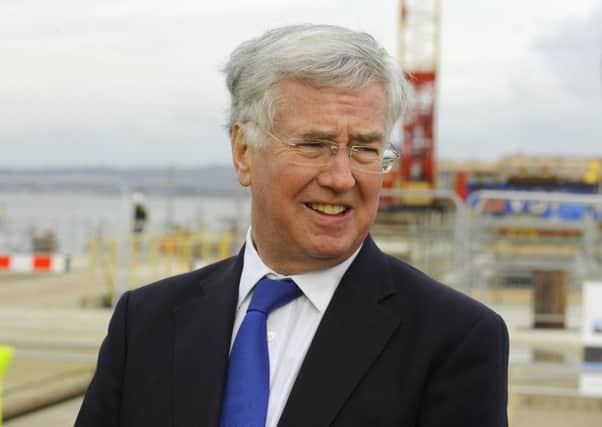 Defence secretary Sir Michael Fallon during a visit to Portsmouth last year. Photo:  Malcolm Wells