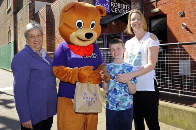 From left, Roberts Centre chief executive Carole Damper, Robert Bear, eight-year-old Matthew Smith and his mum Rachel, 38 Picture: Malcolm Wells (170418-0947)