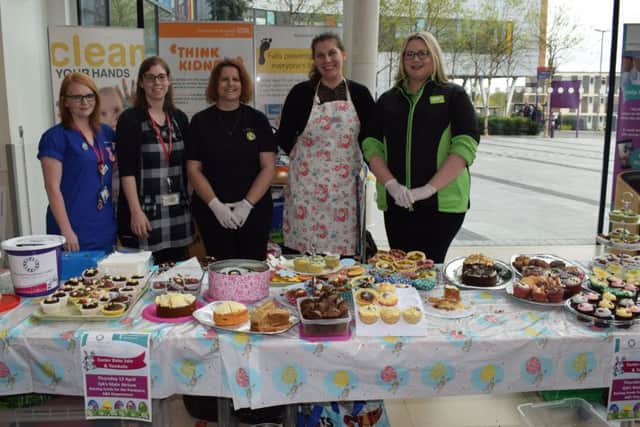 Waitrose and Asda held a cake sale to raise cash for QA Hospital